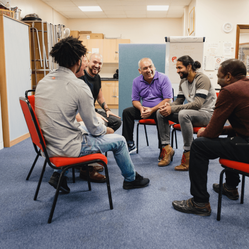 Group Therapy Session In Sober Living