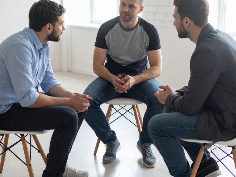 Men In Group Therapy Session